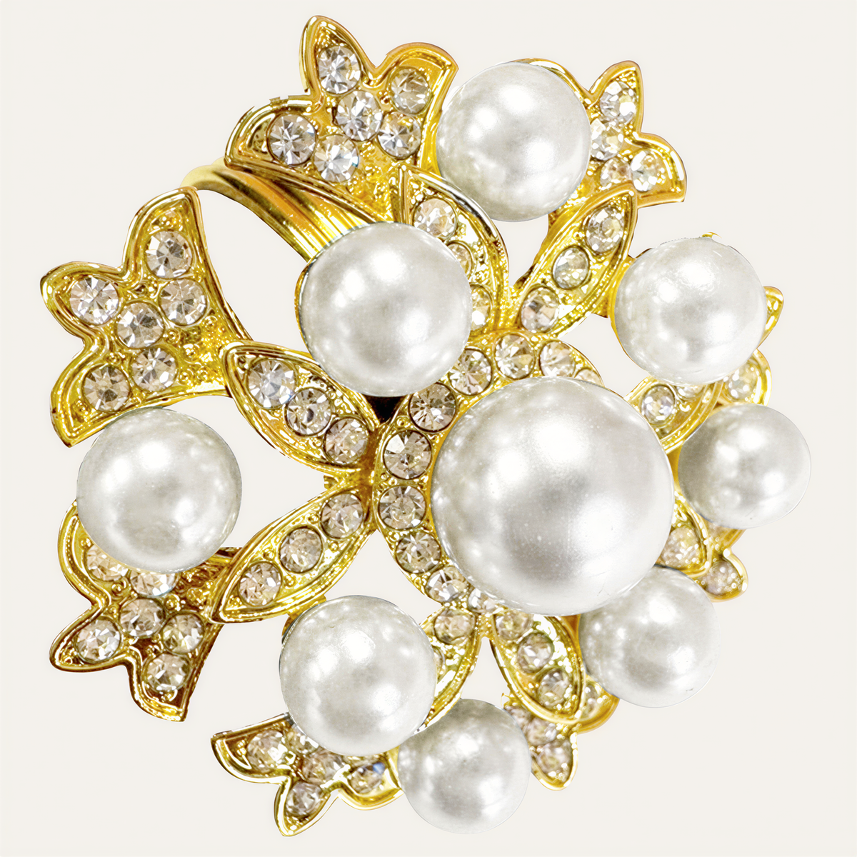Set of four ZWZ-18-018 Golden Bloom napkin rings featuring gold floral and pearl design for elegant dining table décor.