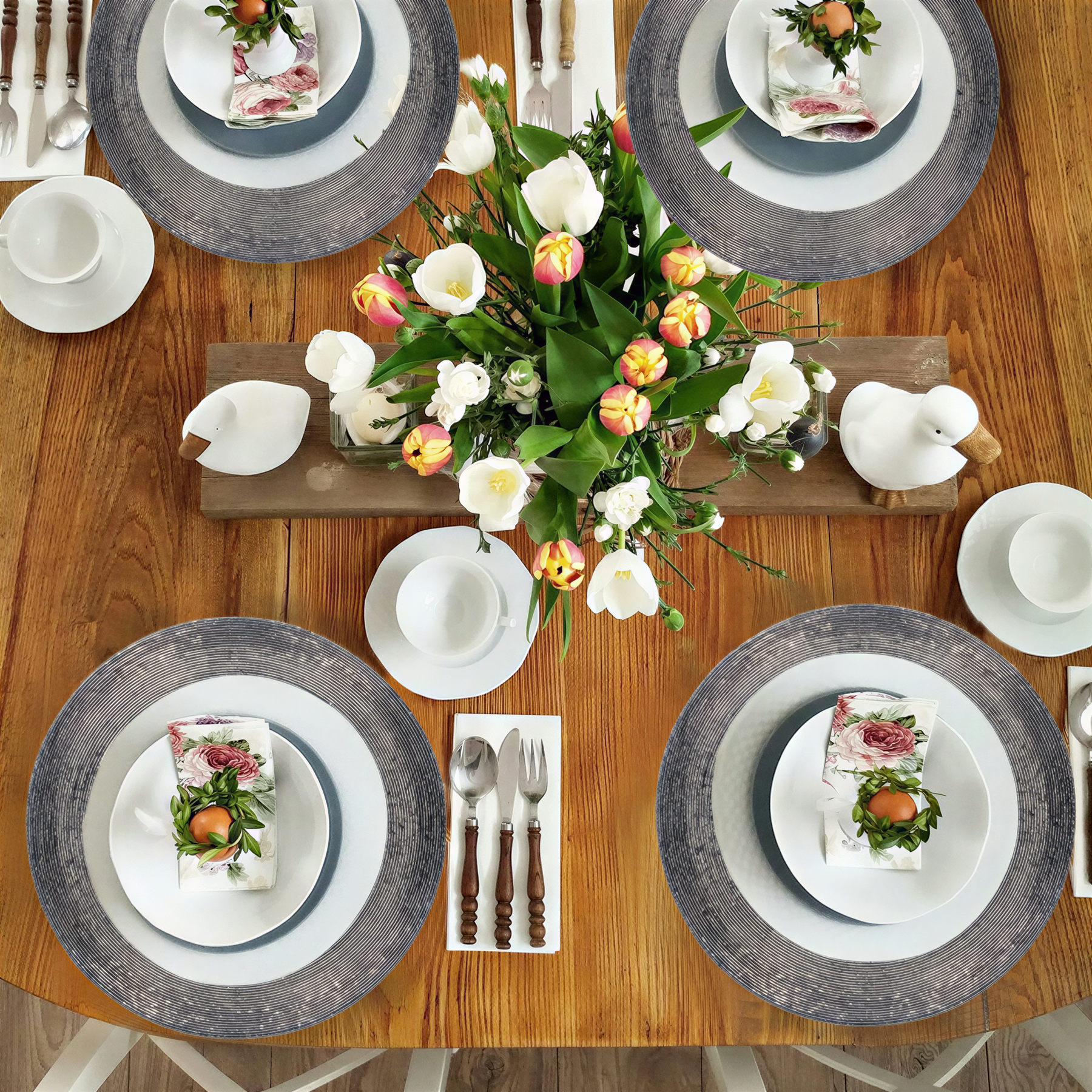 Set of four Dylian Grace beaded placemats from the Dylian Collection, decorative 14-inch table decor for elegant dining.