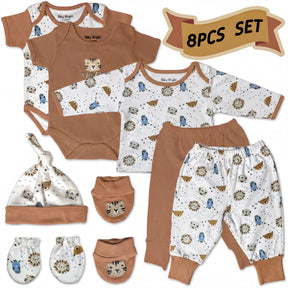 A set of baby clothing and accessories, including a onesie, pants, socks, a hat, and mittens, all featuring a playful animal print pattern.