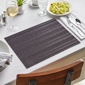 Set of four PVC placemats for dining table by 81811, featuring durable, colorful surface protection for meals and gatherings.