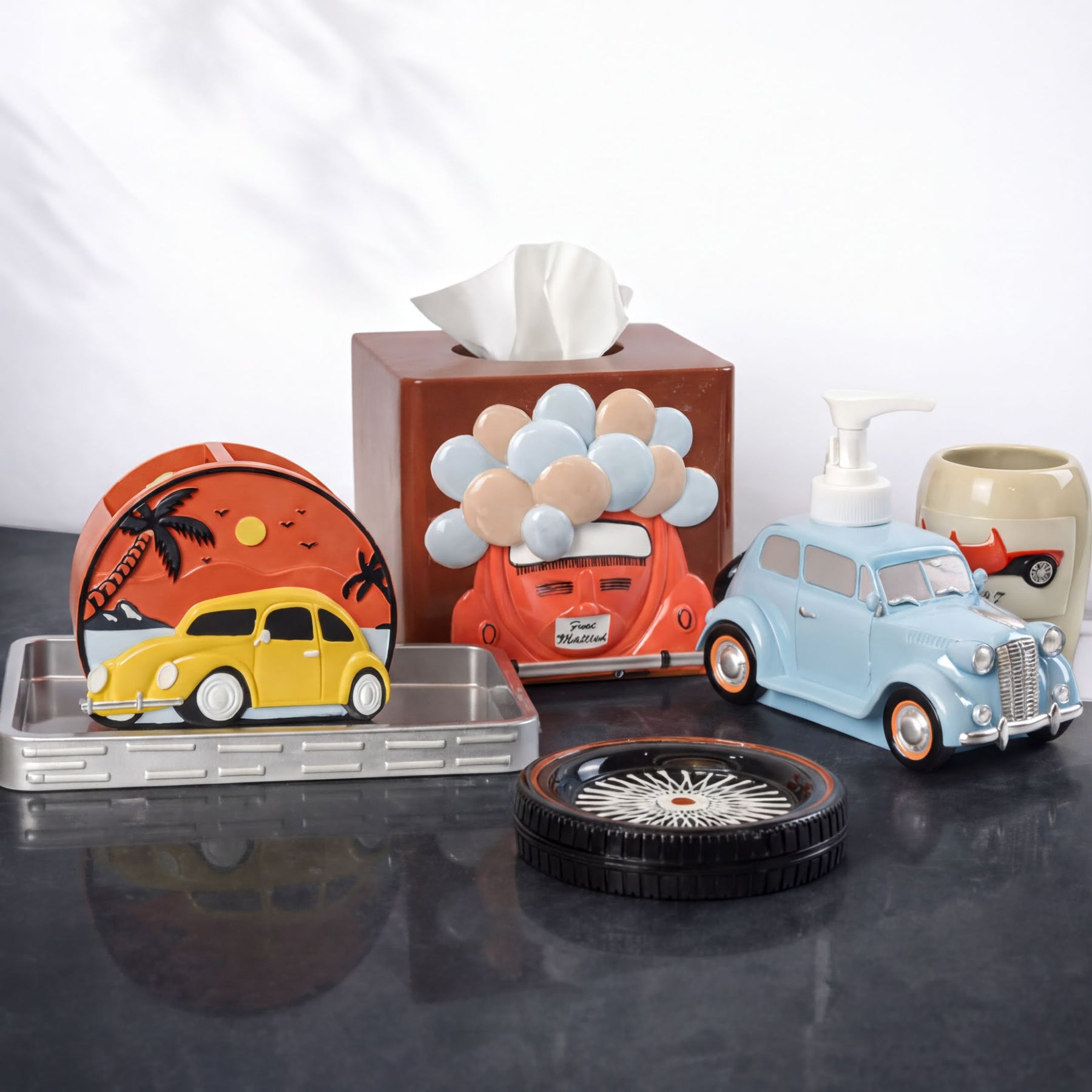Set of six modern bathroom décor accessories from the Racer Collection by AH7008, including soap dispensers, toothbrush holders, and trays.