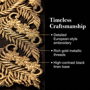 The image is a close-up of a detailed European-style embroidery on a fabric, showcasing the intricate gold metallic threads and the high-contrast black linen base.