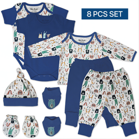 A set of baby clothing items, including a blue onesie, long-sleeved shirt, pants, socks, and a hat, arranged on a white background.