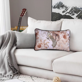 a cozy living room with a white couch adorned with a floral pillow and a gray blanket. In the background, there is a guitar and a mountain landscape, creating a harmonious and inviting atmosphere.