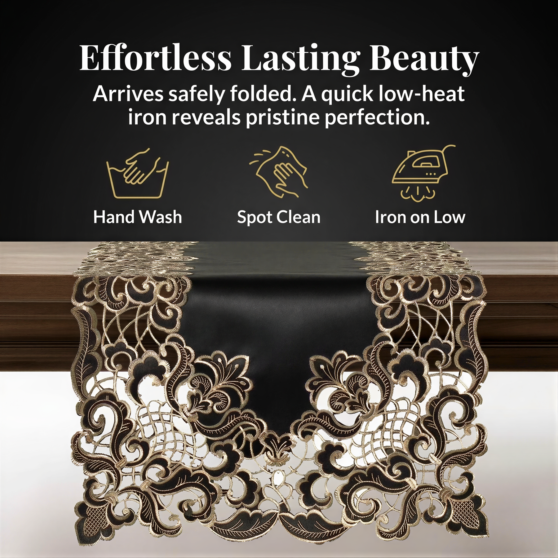 a black and gold table runner with intricate lace-like patterns, placed on a wooden surface. The runner has a black background with gold accents, and it appears to be folded and ready for use.