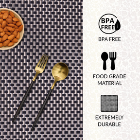 Black and gold PVC placemats with a decorative pattern, heat and scratch resistant, washable indoor and outdoor table protectors.
