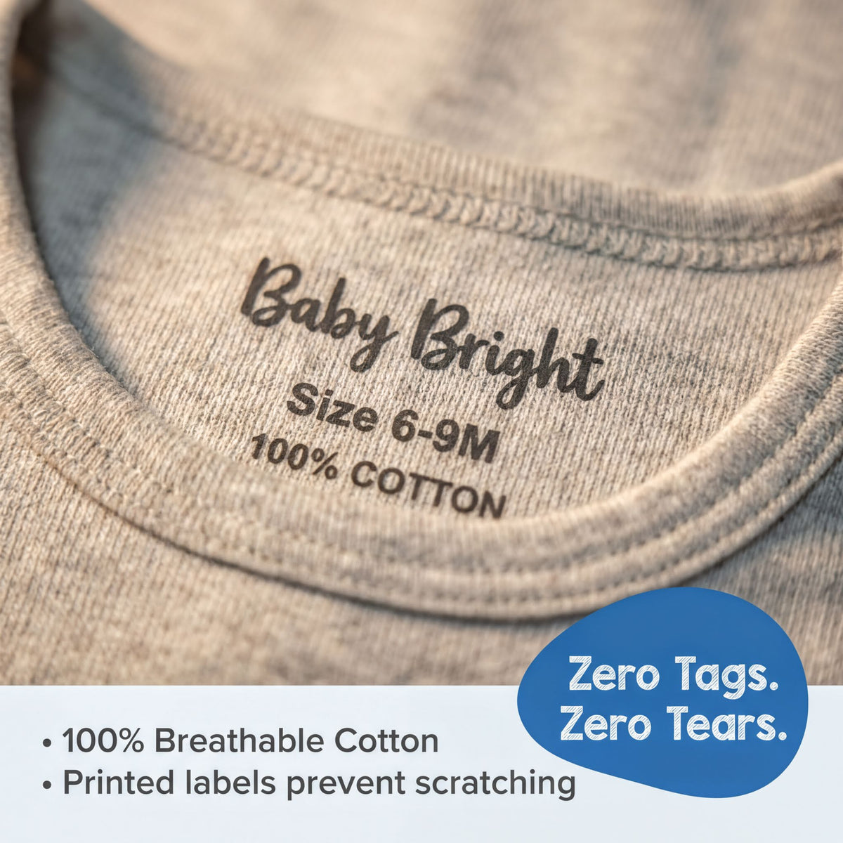 a close-up of a gray baby shirt with a label indicating the size and material.