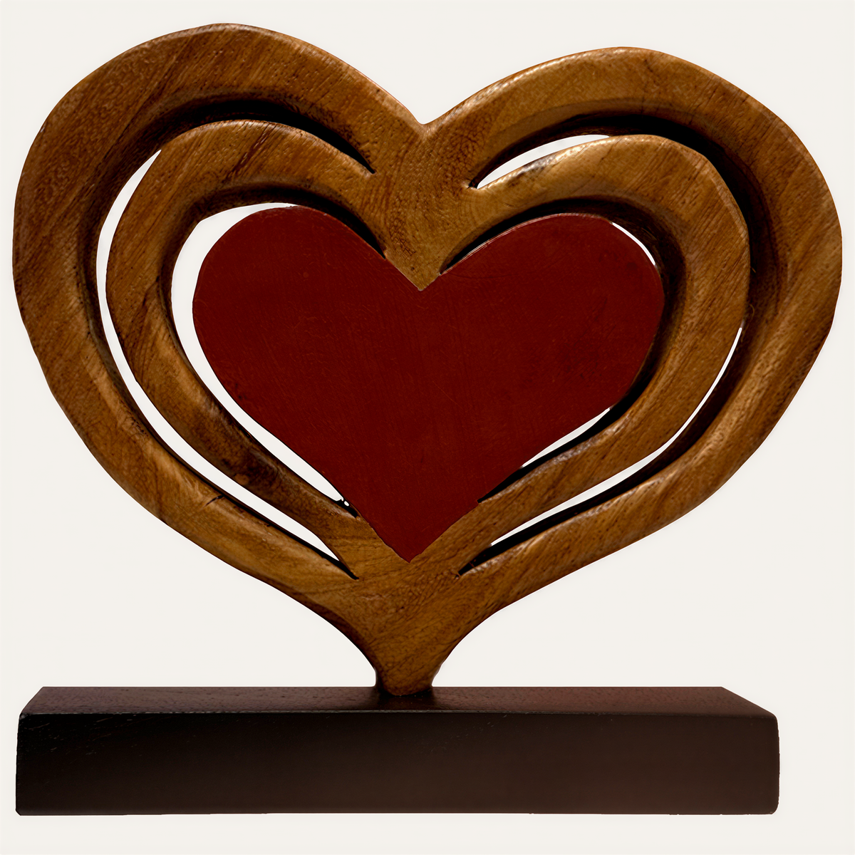 Handmade wooden sculpture titled Serene Hearts, featuring elegant carved hearts, perfect for stylish home décor.