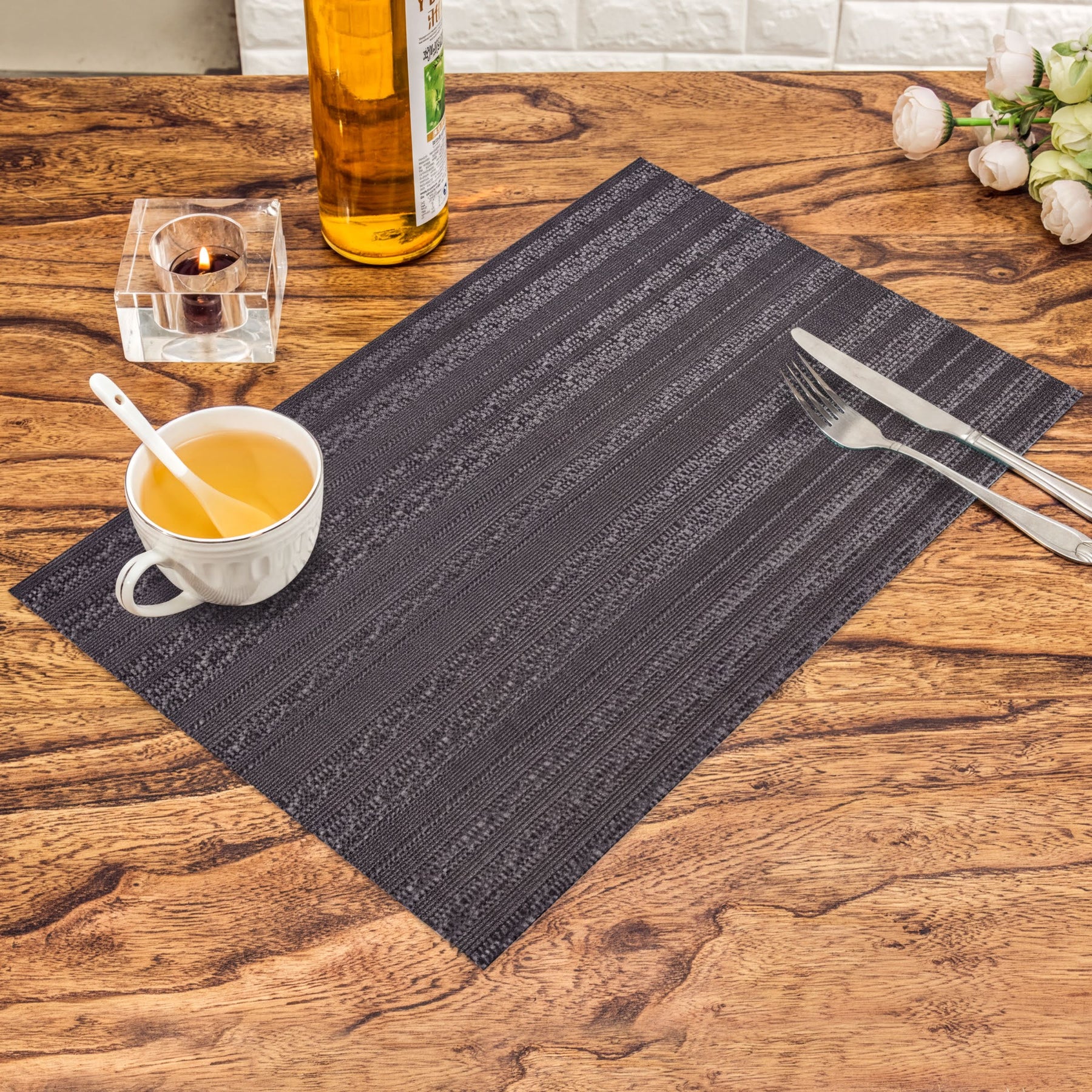 Set of four PVC placemats for dining table by 81811, featuring durable, colorful surface designed for meal settings.