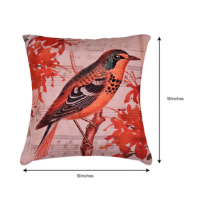 A decorative throw pillow with a vibrant illustration of a colorful bird perched on a branch, surrounded by red flowers.