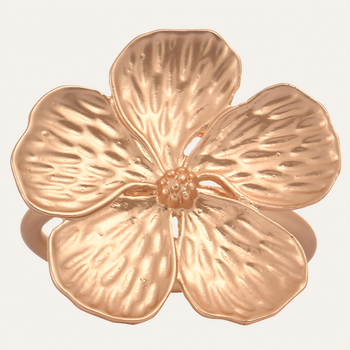 Set of four ZWZ-18-482MG golden napkin rings with floral design, elegant decorative tableware for luxurious dining settings.