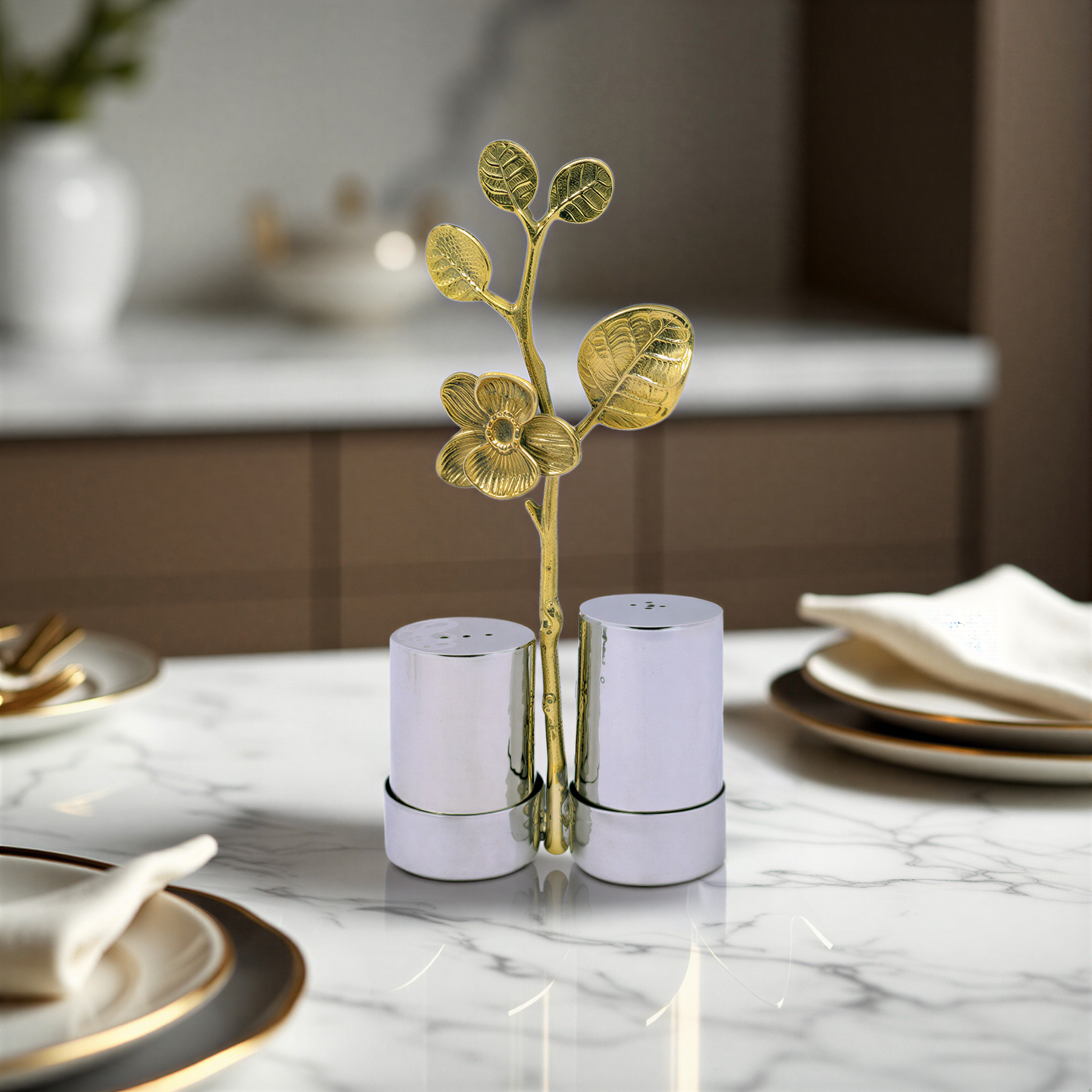 Salt and pepper shaker set for kitchen décor, featuring stylish ceramic shakers with black and white design.