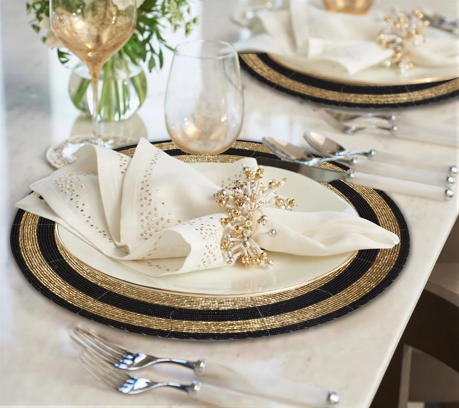 Set of four BD 023 014 The Aidan beaded placemats with intricate beaded design for elegant table setting.