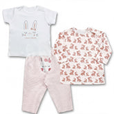 a white t-shirt with a bunny design, pink and white striped pants, and a long-sleeved shirt with a bunny pattern.