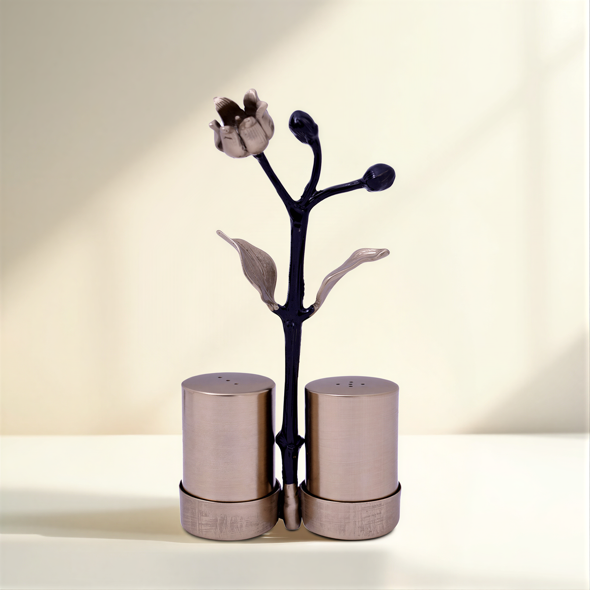 Etched salt and pepper shaker set from 25083ELBA, stylish kitchen décor with detailed glass shakers for seasoning.