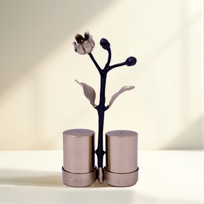 Etched salt and pepper shaker set from 25083ELBA, stylish kitchen décor with detailed glass shakers for seasoning.
