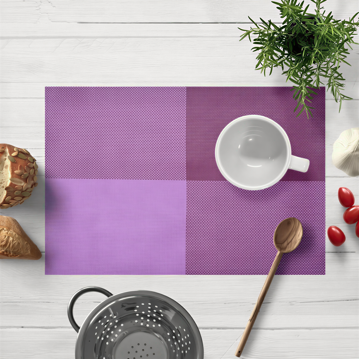 Pink and purple PVC placemats with a decorative pattern, heat resistant and washable, measuring 18x12 inches for indoor and outdoor use.