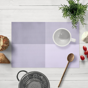 Set of 22279 Notting Hill white and gray PVC placemats, washable and heat-resistant for dining table protection.