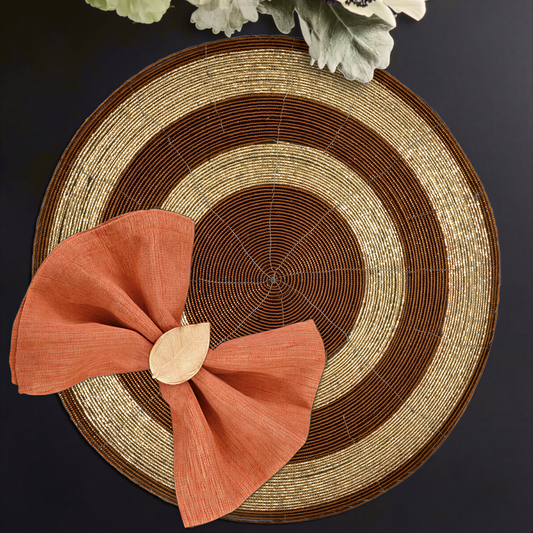 Set of four Dillen Grace beaded placemats from The Dillen Collection, decorative 14-inch table decor with elegant beaded design.