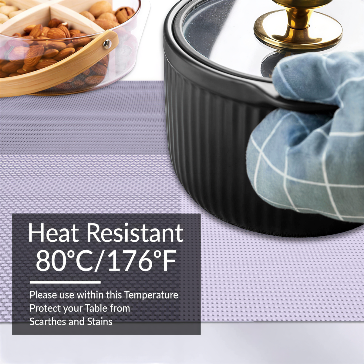 Set of four Notting Hill white and gray PVC placemats, washable and heat-resistant for dining table use.