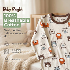 The image is an advertisement for Baby Bright baby clothing, featuring a close-up of a white long-sleeved shirt with a pattern of cartoon bear faces.