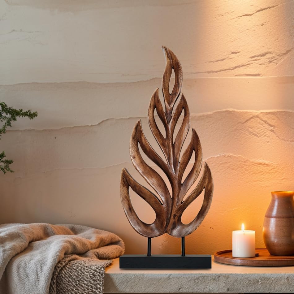 Hand-carved wooden sculpture of a leaf by PAT026, artistic wooden décor piece showcasing intricate craftsmanship.