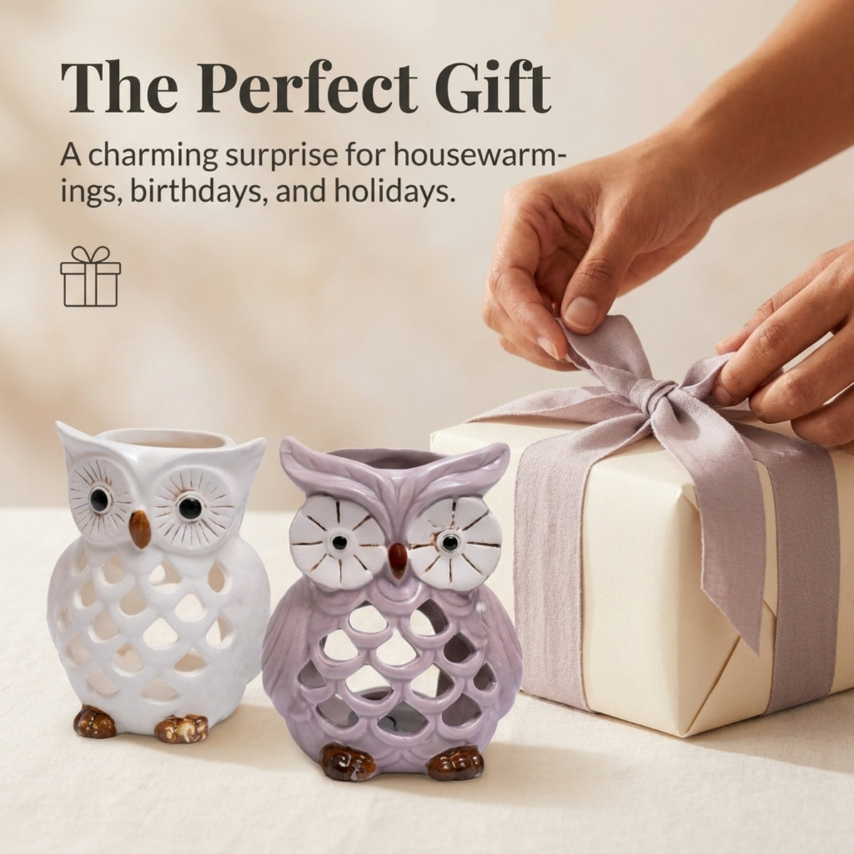 Set of two Hampton Lucky Owl candle holders with tea lights, featuring detailed owl designs in a bronze finish.