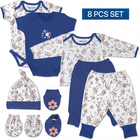 A set of baby clothing and accessories, including a blue onesie, a blue shirt, a blue hat, a pair of blue pants, and a pair of blue socks.