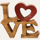 Hand-carved wooden sculpture titled Elmija Enduring Love by LAY013, decorative handmade wooden art for home decor.