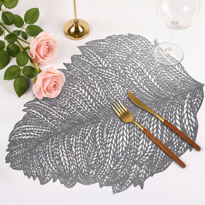Set of six leaf-shaped cut out vinyl placemats by AMF033-SLV featuring elegant leaf design for dining tables.