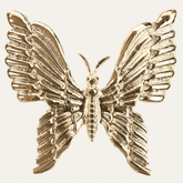 Set of four Golden Flutter napkin rings with gold butterfly design, elegant decorative tableware for sophisticated dining settings.