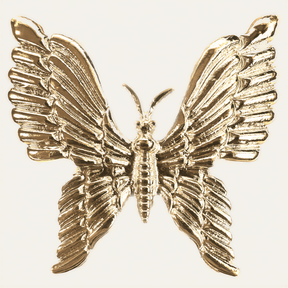Set of four Golden Flutter napkin rings with gold butterfly design, elegant decorative tableware for sophisticated dining settings.
