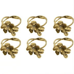 Set of four gold bee design napkin rings from 0024A171107, elegant and decorative for table settings.
