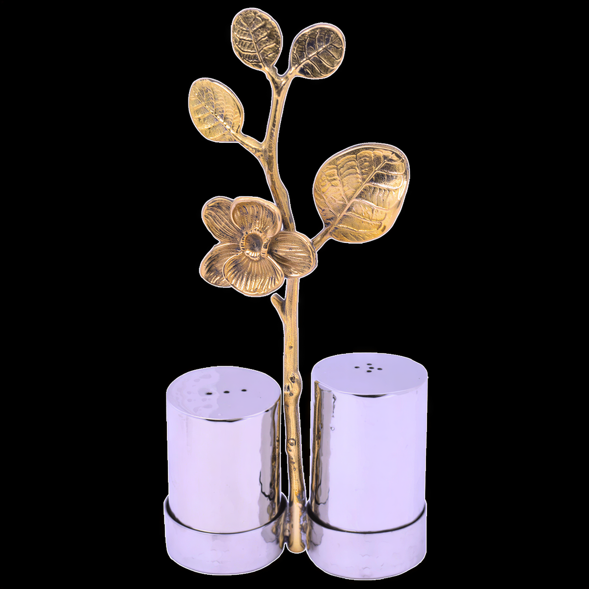 Salt and pepper shaker set for kitchen decor, featuring stylish ceramic shakers with black and white finishes.