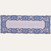 White and blue beaded table runner by RNR, 54 inches long and 13 inches wide, with intricate bead detailing on fabric.