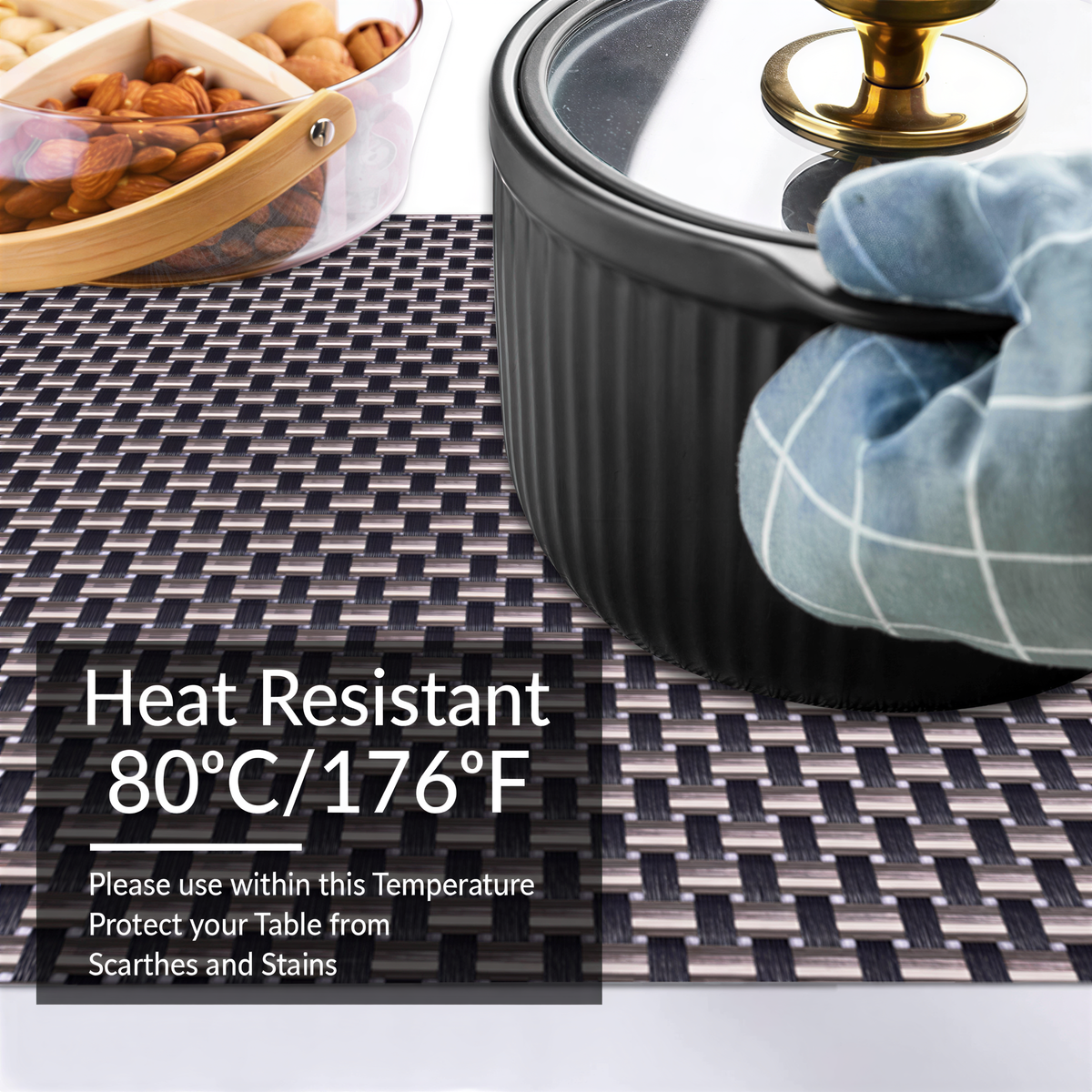 Black and gold PVC placemats with a stylish design, heat-resistant and washable, perfect for indoor and outdoor dining.