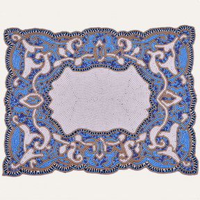 Set of two Azure Glow embroidered beaded placemats in blue and white, heat-resistant table decor, 12x16 inches.