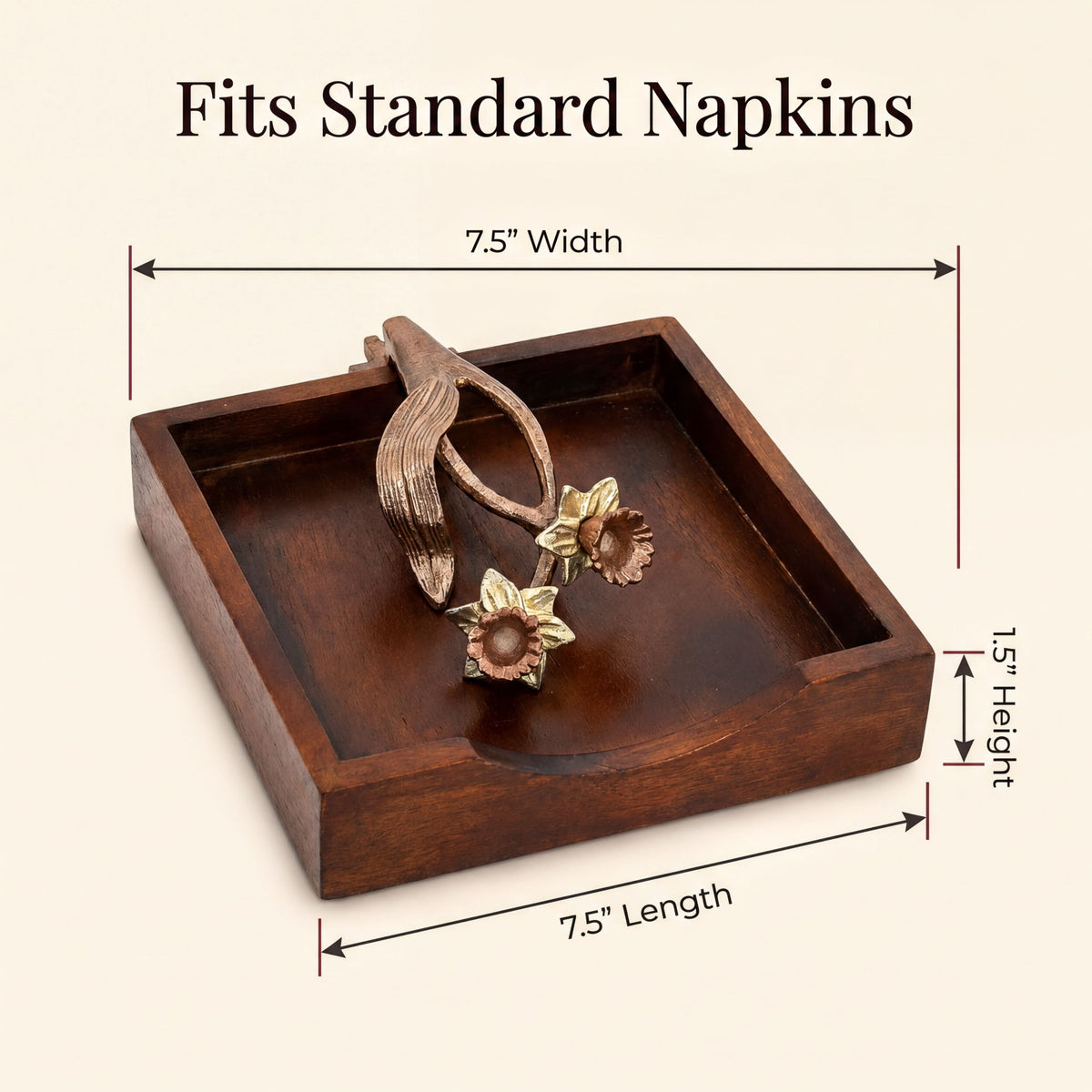 a wooden napkin holder with a pair of tongs and two flower-shaped ornaments on it. The napkin holder is described as "Fits Standard Napkins" and has dimensions of 7.5 inches wide and 7.5 inches long.