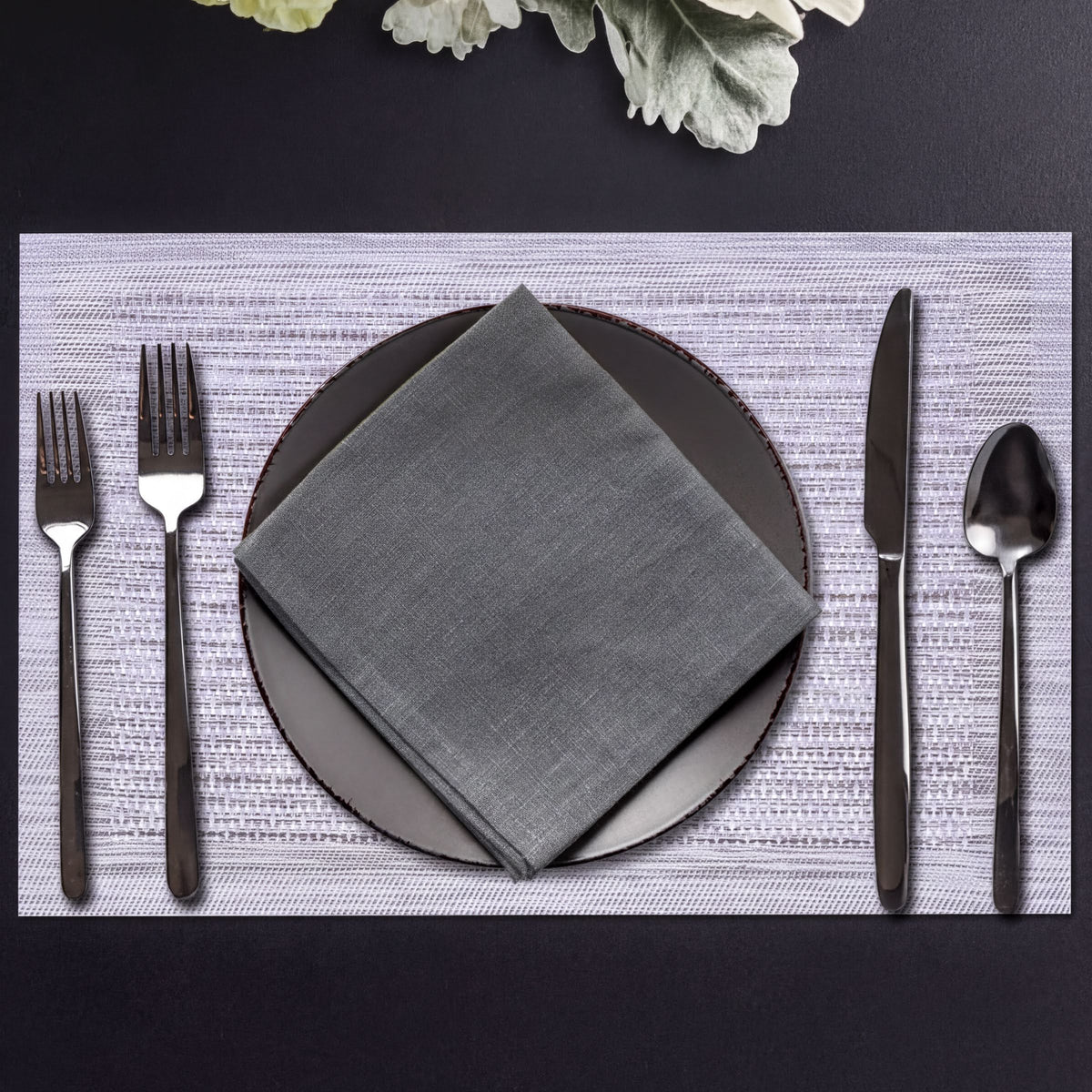 Set of four PVC placemats for dining table, made by 31730, featuring durable, easy-to-clean surface in a stylish design.