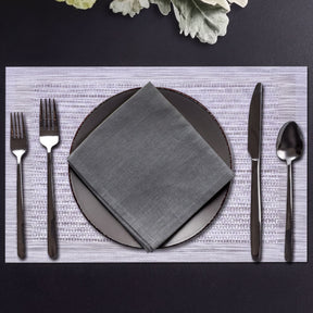 Set of four PVC placemats for dining table, made by 31730, featuring durable, easy-to-clean surface in a stylish design.