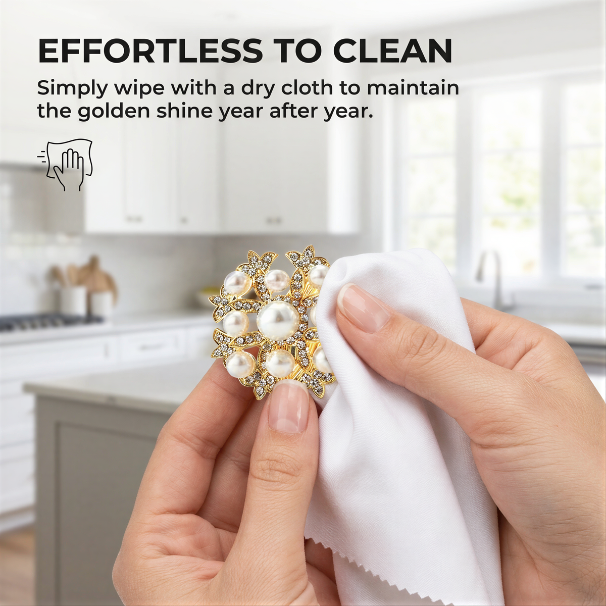 A person's hands holding a white cloth with a decorative piece of jewelry, possibly a brooch or pendant, and a text overlay providing instructions on how to clean the jewelry.