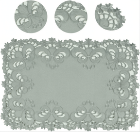 Set of six linen placemats with European embroidery from the Creola Collection, featuring intricate floral designs and elegant craftsmanship.