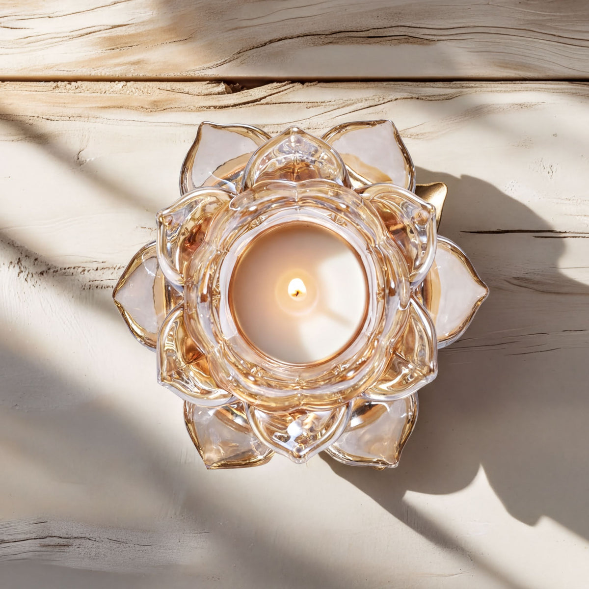 Clear glass floral tea light candle holder from 2016550C, designed for small candles with a decorative floral pattern.