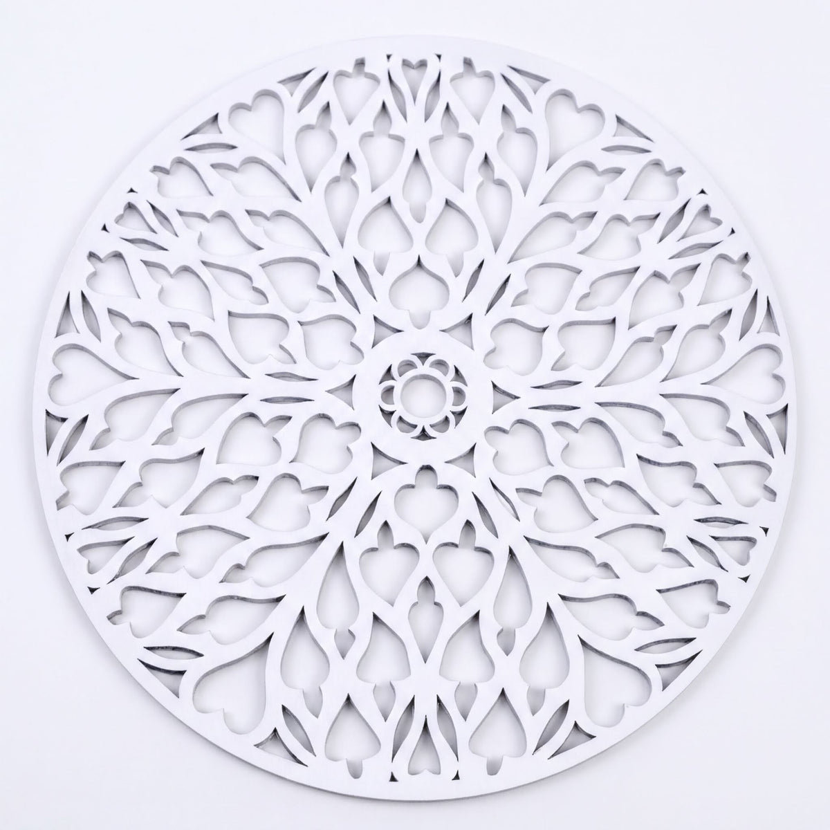 a circular design with a floral pattern, including a central flower and a repeating pattern of leaves and petals.