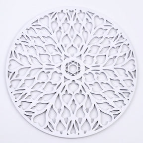 a circular design with a floral pattern, including a central flower and a repeating pattern of leaves and petals.