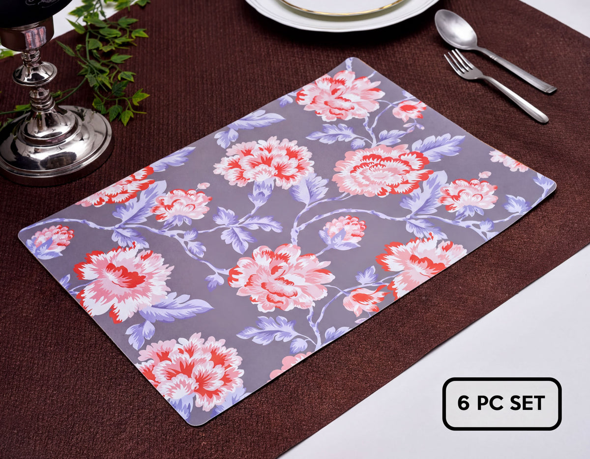 Set of four floral design cork-backed placemats by ATKP-4CK, showcasing colorful flower patterns on cork surface.