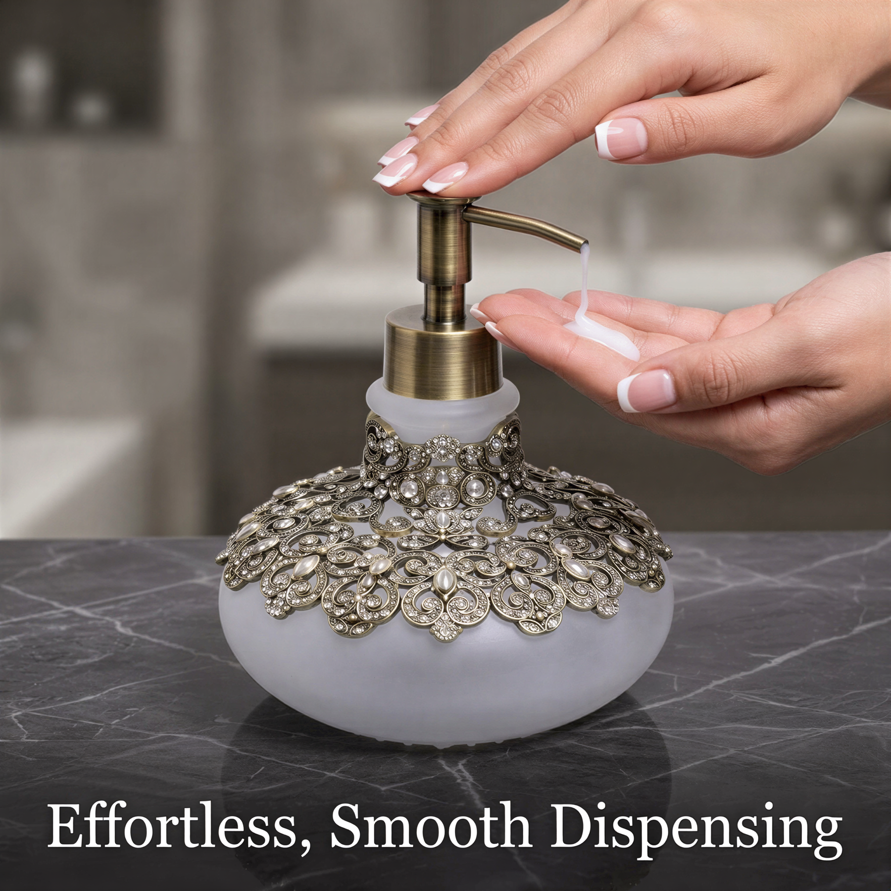 A person's hands are shown applying lotion to a decorative soap dispenser with a floral pattern on a marble countertop.