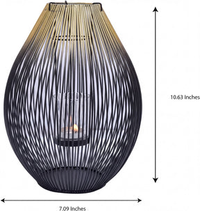 Black and gold candle holder lantern from CA9943-MB, decorative metal lantern for candles, with intricate design and classic style.