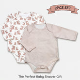 two baby onesies with a bunny pattern, arranged side by side. The onesies have long sleeves and a striped pattern. The image also includes a banner that reads "2PCS SET" and "The Perfect Baby Shower Gift".