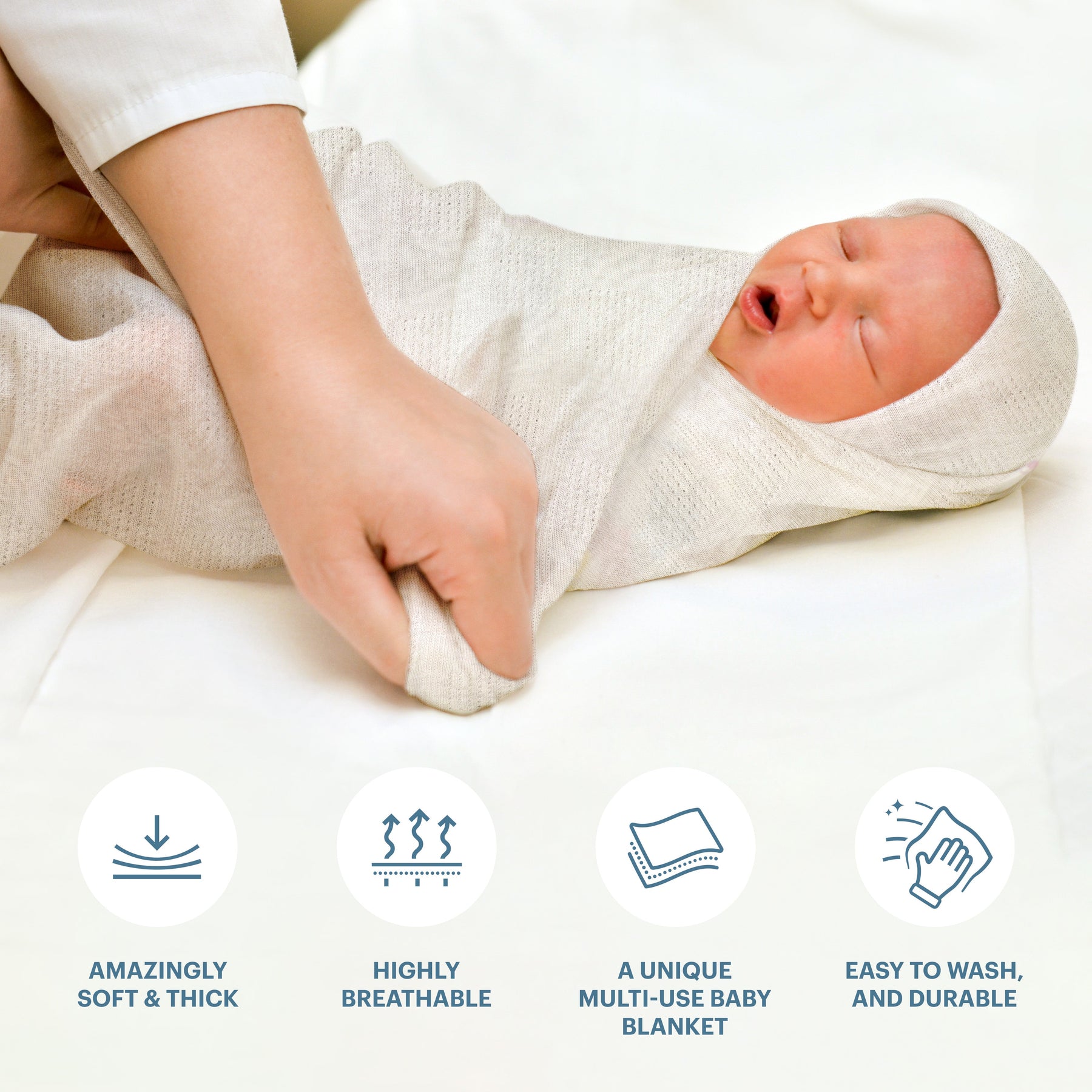 A person is wrapping a baby in a soft and thick blanket, highlighting the blanket's features such as being highly breathable, easy to wash, and durable.